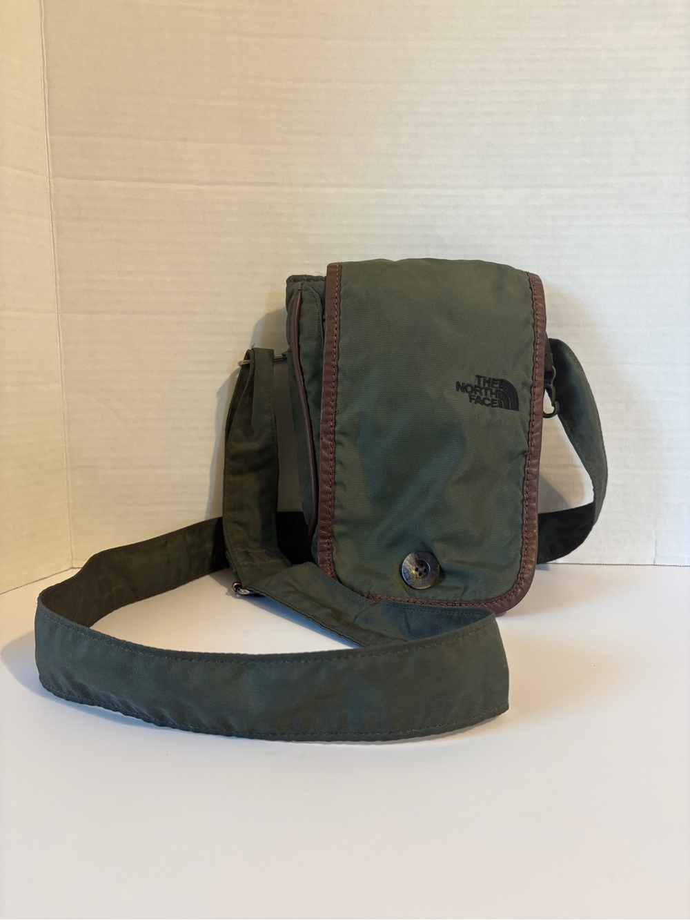 The North Face Olive Green Messenger Crossbody and Magnetic Buttons